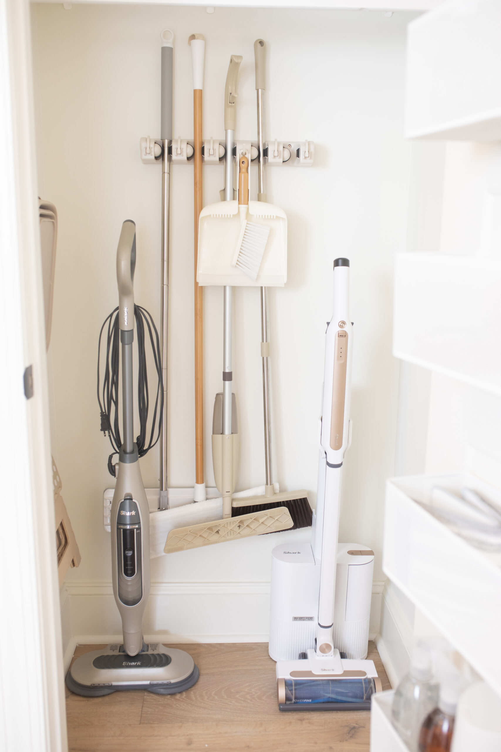 Mop and broom holder for your utility closet