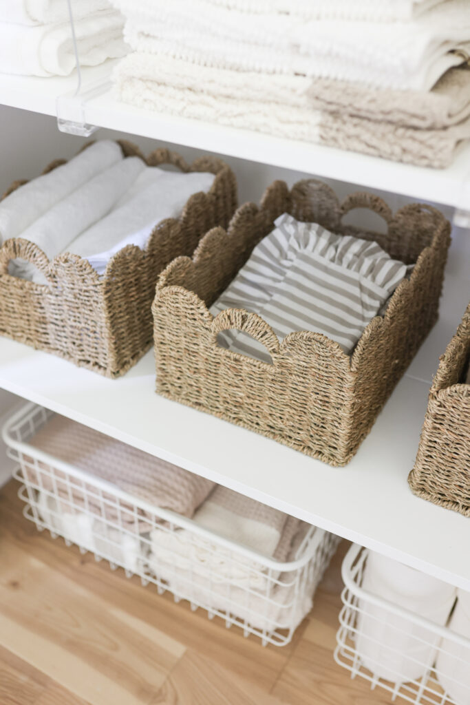 Scalloped baskets to organize your linen closet